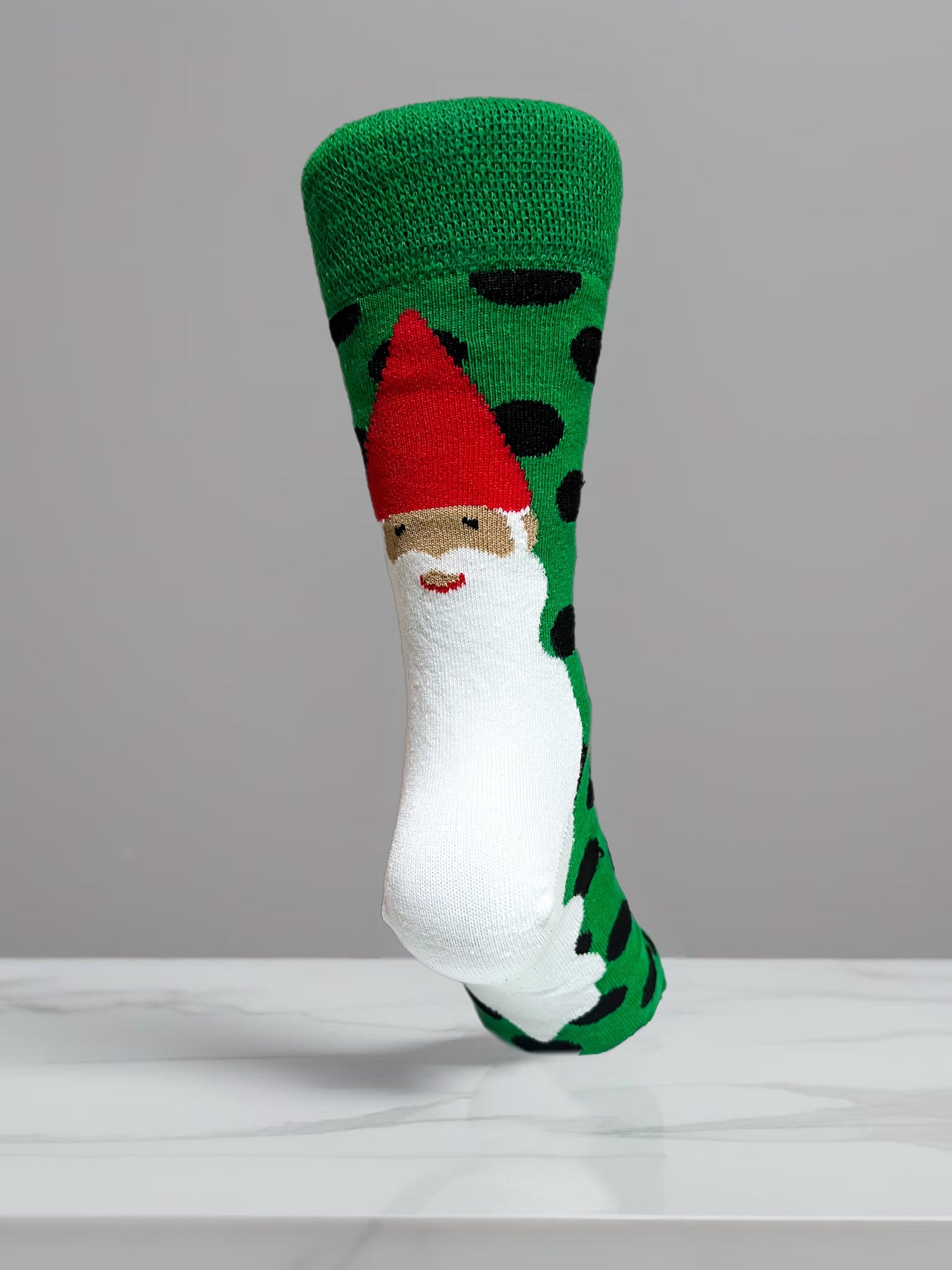Black spotted green socket socks with Santa Claus detail