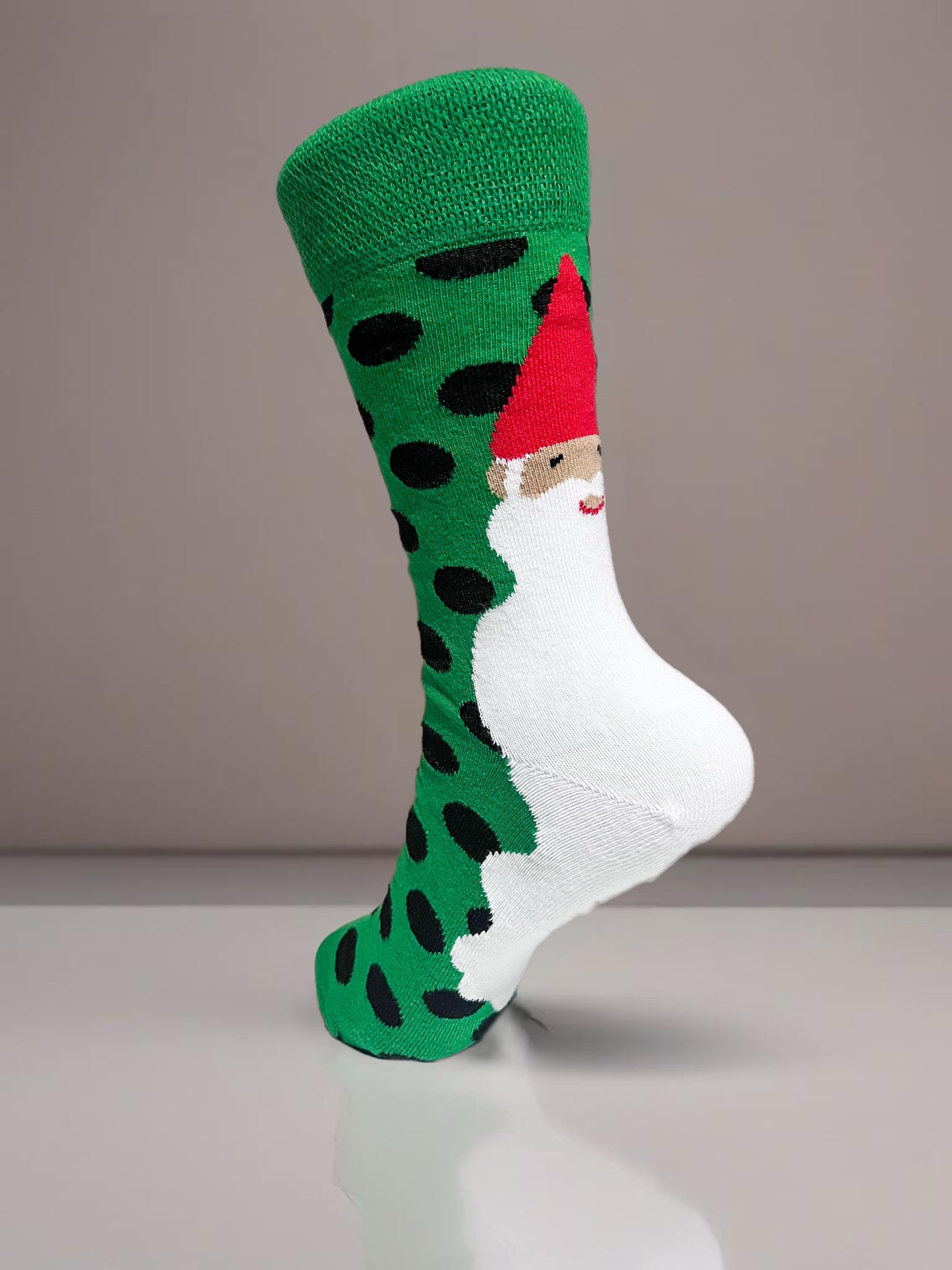 Black spotted green socket socks with Santa Claus detail
